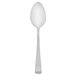 A Walco stainless steel dessert spoon with a long handle on a white background.