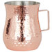 An American Metalcraft copper bell creamer with a handle.