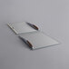 a pen on a glass board