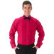 A man wearing a Henry Segal fuchsia tuxedo shirt with a wing tip collar and bow tie.