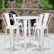 a group of white stools