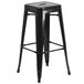 A black metal Flash Furniture square seat backless stool.