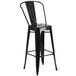 a black bar stool with a back