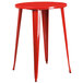 A Flash Furniture red metal bar height table with legs.