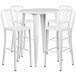 A white Flash Furniture bar table surrounded by white metal chairs with vertical slat backs.