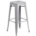 a silver stool with a seat