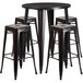 A Flash Furniture black metal bar height table with four square seat backless stools.