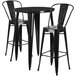 A Flash Furniture black metal bar table with two black metal bar stools.