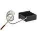 A black box with a white coil attached to it.