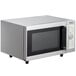 A silver Galaxy MW1000PD microwave oven with a black door open.