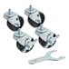 Four black Beverage-Air casters with black rubber wheels and a screw.