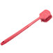 A red Carlisle Sparta pot scrub brush with a handle.