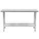 An Advance Tabco stainless steel work table with a galvanized undershelf.