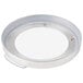 A round white metal plate with a white circle in the center.