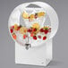 A white Rosseto beverage dispenser with fruit inside.