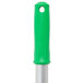 A Unger green and white telescopic pole with a green handle.