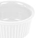 A CAC Super White China fluted ramekin with a round rim.