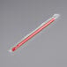 A red plastic Choice spoon straw wrapped in plastic.