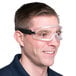 a man wearing safety glasses