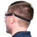 A man wearing Cordova Dust / Splash Safety Goggles with a black headband.