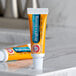 a close up of a tube of toothpaste