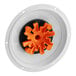 A white Fetco spray housing with orange and black accents.