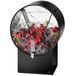 A black Rosseto beverage dispenser with berries inside.