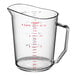 A clear Cambro measuring cup with red and blue measurements.