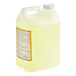 A jug of Noble Chemical low temp dish washing machine sanitizer with a white and yellow label.