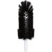 A black circular brush with white bristles.
