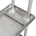 A stainless steel double overshelf with metal bars.