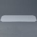 A white rectangular Metro translucent shelf inlay on a gray surface.