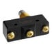 A black and gold Vulcan Hart door switch with brass knobs.