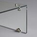 An Avantco glass sneeze guard shelf with metal screws.