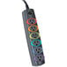 A close-up of a multi-colored Kensington SmartSockets power strip with multiple outlets.