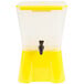 A yellow and white plastic Tablecraft beverage dispenser with a black top.