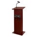 A mahogany Oklahoma Sound power plus lectern with a microphone.