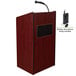 A mahogany wooden Oklahoma Sound Aristocrat lectern with a microphone.