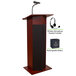 A mahogany wooden Oklahoma Sound Power Plus lectern with a microphone and wireless headset.