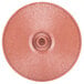 A close-up of a paprika-colored circular polyethylene tortilla server with a hole in the middle.