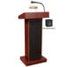 An Oklahoma Sound mahogany podium with a microphone and rechargeable battery.