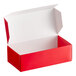 A red 1/2 lb. candy box with a white lid.