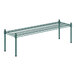 A green metal shelf with green metal legs.