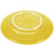 A yellow Fiesta saucer with a white rim.
