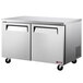 A Turbo Air stainless steel undercounter refrigerator with two doors.