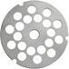 A stainless steel circular metal grinder plate with holes.