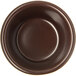 A close-up of a Carlisle chocolate brown melamine ramekin.