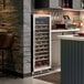A single temperature, full glass door commercial wine cooler filled with wine bottles.