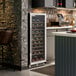 A single temperature full glass door commercial wine cooler filled with wine bottles.