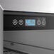 A commercial wine cooler with a digital temperature display and control panel.